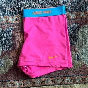 Nike Pro Pink Shorts with Blue Waistband